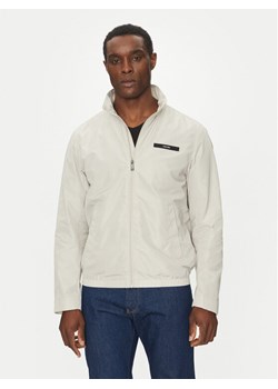 Calvin Klein Kurtka przejściowa Essential K10K114111 Beżowy Regular Fit ze sklepu MODIVO w kategorii Kurtki męskie - zdjęcie 181097361
