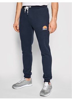Ellesse Spodnie dresowe Ovest SHS01763 Granatowy Regular Fit ze sklepu MODIVO w kategorii Spodnie męskie - zdjęcie 181098481