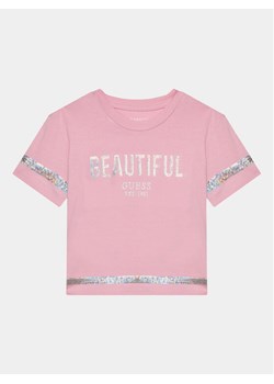 Guess T-Shirt K4RI26 K6YW4 Różowy Regular Fit ze sklepu MODIVO w kategorii Bluzki dziewczęce - zdjęcie 181100433