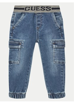 Guess Jeansy N5RA02 D4GV0 Niebieski Regular Fit ze sklepu MODIVO w kategorii Spodnie chłopięce - zdjęcie 181100902