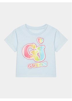 Guess T-Shirt K4RI28 K8HM0 Błękitny Boxy Fit ze sklepu MODIVO w kategorii Bluzki dziewczęce - zdjęcie 181101283