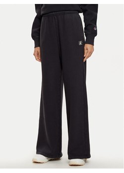 Champion Spodnie dresowe 117661 Czarny Wide Leg ze sklepu MODIVO w kategorii Spodnie damskie - zdjęcie 181102643
