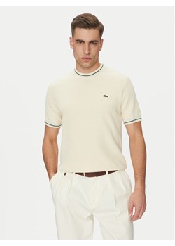 Lacoste Sweter AH9301 Beżowy Regular Fit ze sklepu MODIVO w kategorii Swetry męskie - zdjęcie 181103660