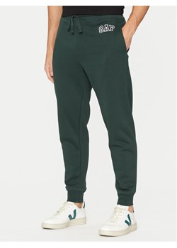 Gap Spodnie dresowe 542221-00 Zielony Regular Fit ze sklepu MODIVO w kategorii Spodnie męskie - zdjęcie 181104962