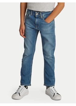 Calvin Klein Jeans Jeansy Essential IB0IB02306 Niebieski Relaxed Fit ze sklepu MODIVO w kategorii Spodnie chłopięce - zdjęcie 181106064