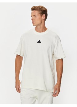 adidas T-Shirt Brand Love IX1321 Biały Loose Fit ze sklepu MODIVO w kategorii T-shirty męskie - zdjęcie 181106700