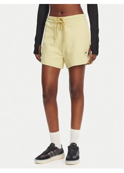 adidas by Stella McCartney Szorty sportowe Stella McCartney True Casuals JI5059 Żółty Loose Fit ze sklepu MODIVO w kategorii Szorty - zdjęcie 181107072