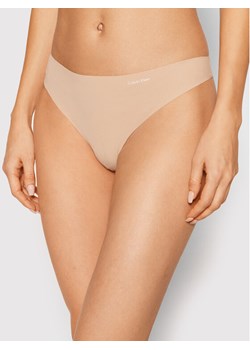 Calvin Klein Underwear Stringi 0000D3428E Beżowy ze sklepu MODIVO w kategorii Majtki damskie - zdjęcie 181107132