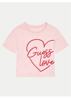 Guess T-Shirt J4YI06 K8HM4 Różowy Boxy Fit ze sklepu MODIVO w kategorii Bluzki dziewczęce - zdjęcie 181107421