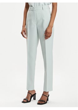 Calvin Klein Chinosy K20K205959 Zielony Slim Fit ze sklepu MODIVO w kategorii Spodnie damskie - zdjęcie 181108103