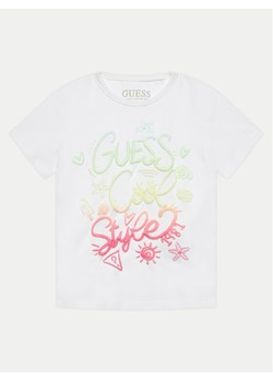 Guess T-Shirt K4GI04 K6YW1 Biały Regular Fit ze sklepu MODIVO w kategorii Bluzki dziewczęce - zdjęcie 181109403