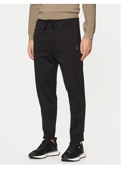 BOSS Spodnie dresowe Hadiko TL 50543434 Czarny Regular Fit ze sklepu MODIVO w kategorii Spodnie męskie - zdjęcie 181109820