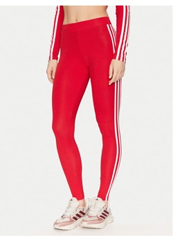 adidas Legginsy Adicolor Classics 3-Stripes Leggings IB7382 Czerwony ze sklepu MODIVO w kategorii Spodnie damskie - zdjęcie 181113092
