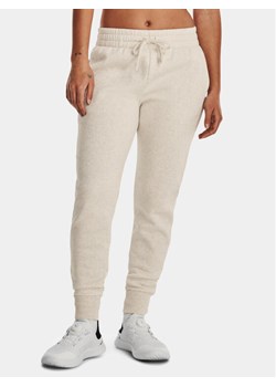 Under Armour Spodnie dresowe Ua Rival Fleece Jogger 1379438-783 Beżowy Loose Fit ze sklepu MODIVO w kategorii Spodnie damskie - zdjęcie 181113643