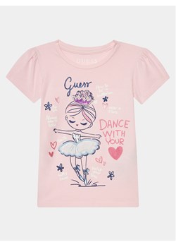 Guess T-Shirt K4RI21 K6YW4 Różowy Regular Fit ze sklepu MODIVO w kategorii Bluzki dziewczęce - zdjęcie 181114374