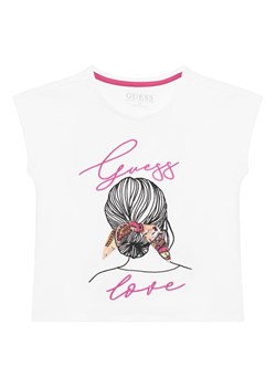 Guess T-Shirt J5GI25 K6YW4 Biały Regular Fit ze sklepu MODIVO w kategorii Bluzki dziewczęce - zdjęcie 181117262