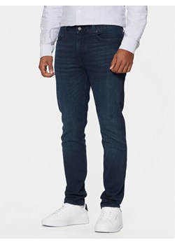 Tommy Hilfiger Jeansy Bleecker MW0MW39042 Niebieski Slim Fit ze sklepu MODIVO w kategorii Jeansy męskie - zdjęcie 181117854