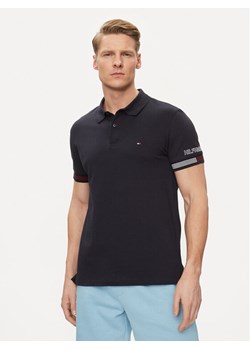 Tommy Hilfiger Polo Flag MW0MW34780 Granatowy Slim Fit ze sklepu MODIVO w kategorii T-shirty męskie - zdjęcie 181118523