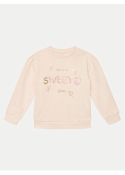 Guess Bluza K5GQ01 KA6R4 Różowy Regular Fit ze sklepu MODIVO w kategorii Bluzy dziewczęce - zdjęcie 181119264