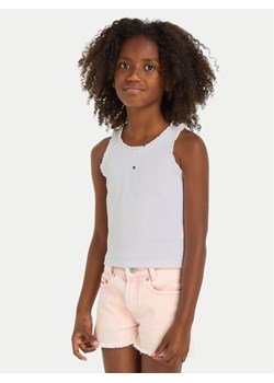 Tommy Hilfiger Top Essential KG0KG07905 Biały Regular Fit ze sklepu MODIVO w kategorii Bluzki dziewczęce - zdjęcie 181121572