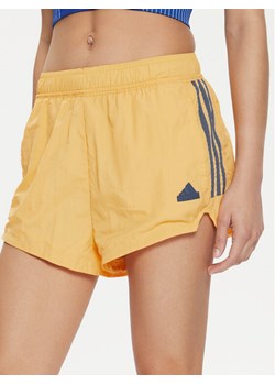 adidas Szorty sportowe Tiro Cut 3-Stripes IS0722 Żółty Loose Fit ze sklepu MODIVO w kategorii Szorty - zdjęcie 181121872
