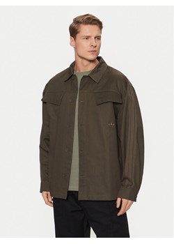 adidas Koszula Premium Essentials Workwear JD3343 Khaki Loose Fit ze sklepu MODIVO w kategorii Koszule męskie - zdjęcie 181122332