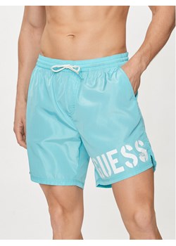 Guess Szorty kąpielowe F4GT28 WG292 Błękitny Regular Fit ze sklepu MODIVO w kategorii Kąpielówki - zdjęcie 181123731