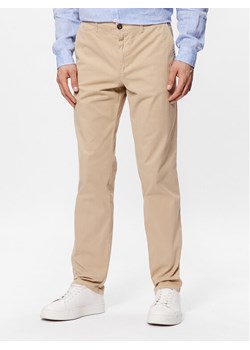 United Colors Of Benetton Spodnie materiałowe 4DKH55I18 Beżowy Slim Fit ze sklepu MODIVO w kategorii Spodnie męskie - zdjęcie 181125691