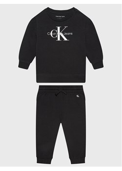 Calvin Klein Jeans Dres Monogram IN0IN00017 Czarny Regular Fit ze sklepu MODIVO w kategorii Dresy dla niemowlaka - zdjęcie 181126740