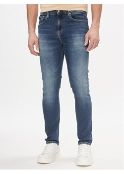 Calvin Klein Jeans Jeansy Skinny J30J324198 Granatowy Skinny Fit ze sklepu MODIVO w kategorii Jeansy męskie - zdjęcie 181127224