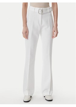 HUGO Spodnie materiałowe 50537602 Biały Flare Fit ze sklepu MODIVO w kategorii Spodnie damskie - zdjęcie 181128154