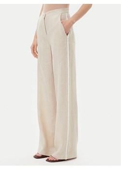 ICONA Spodnie materiałowe RP5LE005 Beżowy Relaxed Fit ze sklepu MODIVO w kategorii Spodnie damskie - zdjęcie 181129054