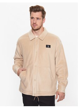 Calvin Klein Jeans Kurtka przejściowa J30J323704 Beżowy Regular Fit ze sklepu MODIVO w kategorii Kurtki męskie - zdjęcie 181130371