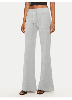 Juicy Couture Spodnie dresowe Layla JCSEBJ001 Szary Flared Leg ze sklepu MODIVO w kategorii Spodnie damskie - zdjęcie 181132221