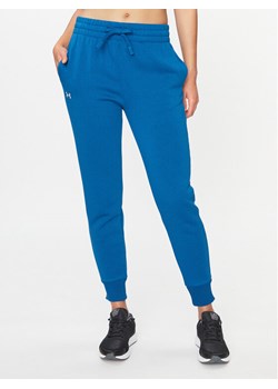 Under Armour Spodnie dresowe Ua Rival Fleece Jogger 1379438 Niebieski Loose Fit ze sklepu MODIVO w kategorii Spodnie damskie - zdjęcie 181132410