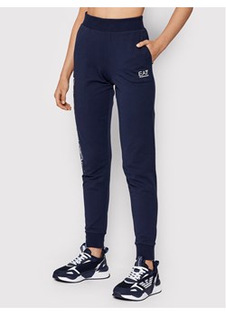 EA7 Emporio Armani Spodnie dresowe 8NTP85 TJCQZ 1554 Granatowy Regular Fit ze sklepu MODIVO w kategorii Spodnie damskie - zdjęcie 181133591
