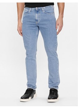 Calvin Klein Jeans Jeansy J30J323690 Niebieski Slim Taper Fit ze sklepu MODIVO w kategorii Jeansy męskie - zdjęcie 181134602