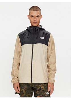 The North Face Wiatrówka Cyclone III NF0A82R9 Beżowy Regular Fit ze sklepu MODIVO w kategorii Kurtki męskie - zdjęcie 181135113