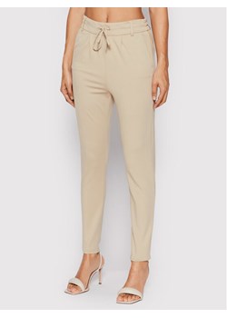 ONLY Spodnie materiałowe Poptrash 15115847 Beżowy Slim Fit ze sklepu MODIVO w kategorii Spodnie damskie - zdjęcie 181137420