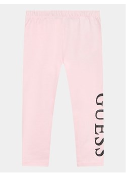 Guess Legginsy K3YB01 K82K0 Różowy Slim Fit ze sklepu MODIVO w kategorii Spodnie dziewczęce - zdjęcie 181137442