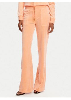 Juicy Couture Spodnie dresowe Layla JCSEBJ001 Pomarańczowy Flared Leg ze sklepu MODIVO w kategorii Spodnie damskie - zdjęcie 181138724