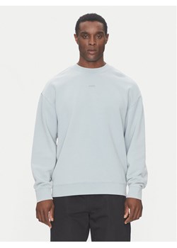 HUGO Bluza Dopaly 50540920 Niebieski Relaxed Fit ze sklepu MODIVO w kategorii Bluzy męskie - zdjęcie 181138830