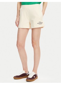 Tommy Hilfiger Szorty sportowe WW0WW45518 Beżowy Regular Fit ze sklepu MODIVO w kategorii Szorty - zdjęcie 181139923