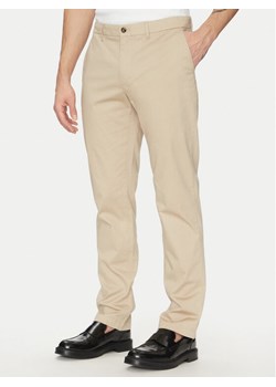 Tommy Hilfiger Chinosy Denton MW0MW37717 Beżowy Slim Fit ze sklepu MODIVO w kategorii Spodnie męskie - zdjęcie 181139970