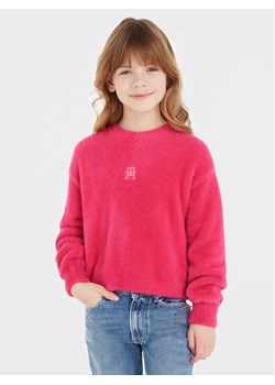 Tommy Hilfiger Sweter KG0KG07802 Różowy Relaxed Fit ze sklepu MODIVO w kategorii Swetry dziewczęce - zdjęcie 181140890