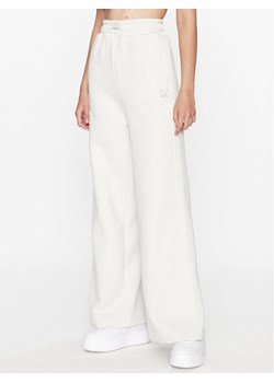 Puma Spodnie dresowe Infuse 621448 Szary Wide Leg ze sklepu MODIVO w kategorii Spodnie męskie - zdjęcie 181140964
