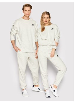 New Balance Spodnie dresowe Unisex UP21500 Szary Ahletic Fit ze sklepu MODIVO w kategorii Spodnie damskie - zdjęcie 181142540