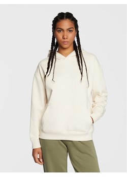 New Balance Bluza Athletics Nature WT23554 Écru Oversize ze sklepu MODIVO w kategorii Bluzy damskie - zdjęcie 181144911