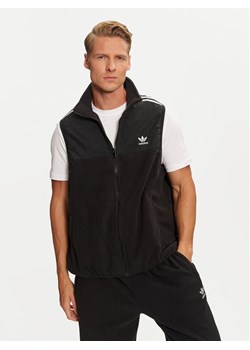 adidas Kamizelka adicolor 3-Stripes IZ4799 Czarny Regular Fit ze sklepu MODIVO w kategorii Kamizelki męskie - zdjęcie 181145080