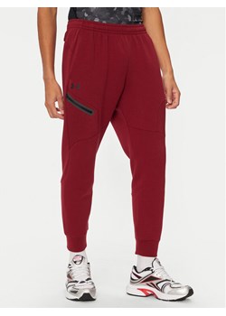 Under Armour Spodnie dresowe UA Unstoppable 1389353 Czerwony Regular Fit ze sklepu MODIVO w kategorii Spodnie męskie - zdjęcie 181145272